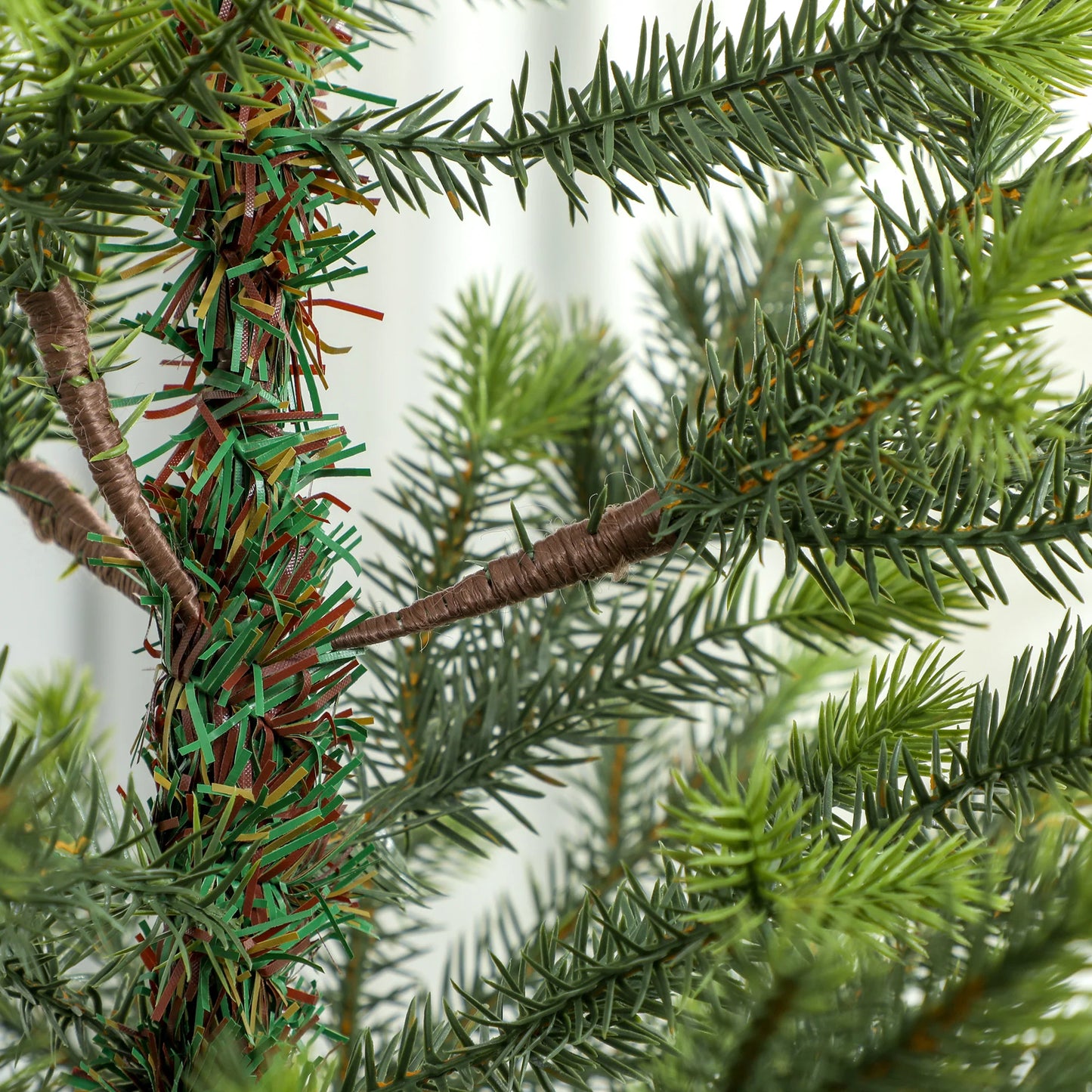 Nine Foot Artificial Christmas Tree With Durable Steel Stand